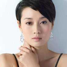 画像をギャラリービューアに読み込む, Sterling Silver Interlocking Diamond Spirals Earrings
